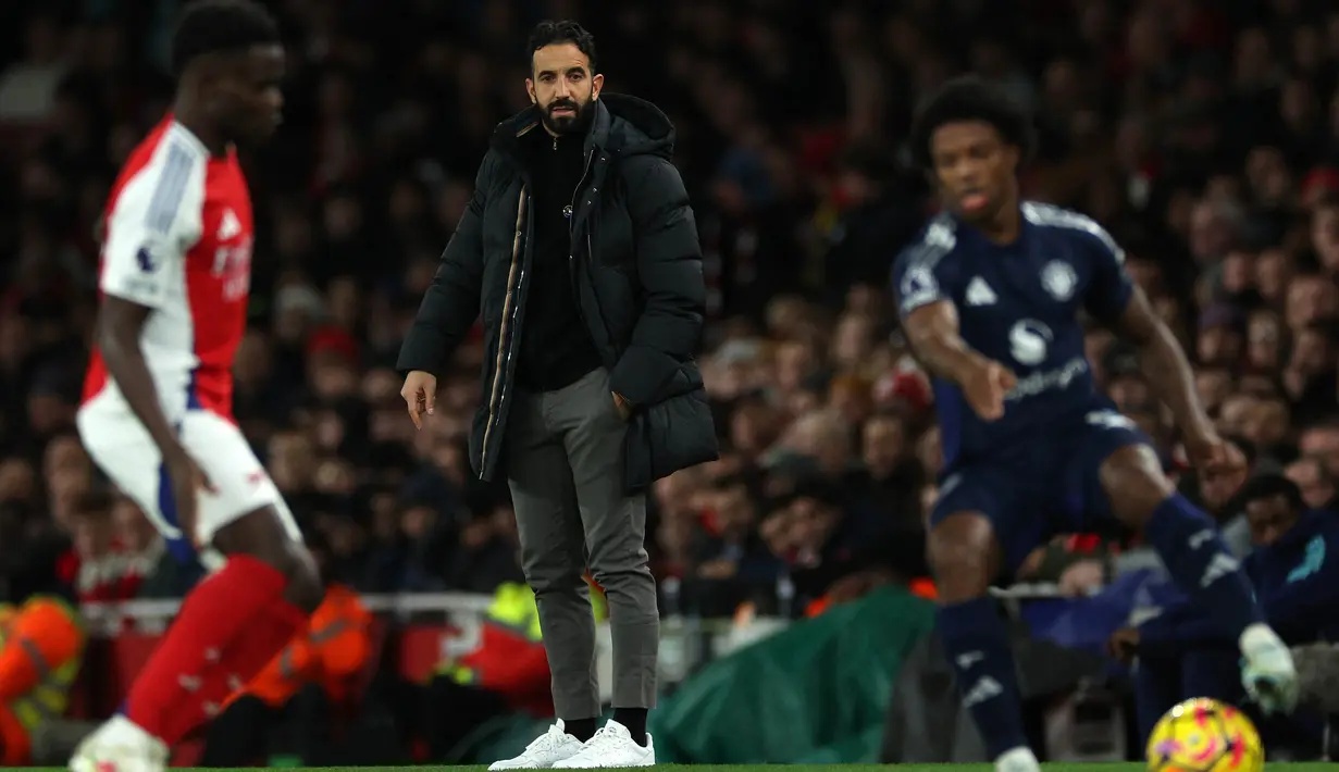 Bermain tandang ke markas Arsenal, tim racikan pelatih Ruben Amorim harus menelan pil pahit kekalahan 0-2. (Adrian Dennis/AFP)