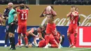 Reaksi pemain Bayern Munchen setelah melihat Jamal Musiala mengalami cedera parah setelah benturan dengan kiper PSG Gianluigi Donnarumma pada babak perempat final Piala Dunia Antarklub 2025 di di Mercedes-Benz Stadium, Sabtu (5/7/2025). (AFP/Alex Grimm)