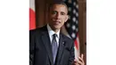 Dalam konferensi pers di Tokyo (24/4/14), Obama menegaskan, Washington terikat perjanjian pertahanan dengan Jepang. (AFP PHOTO/Junko Kimura-Matsumoto)