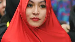 Terpidana kasus suap Wisma Atlet Hambalang, Angelina Sondakh yang kini berhijab, di Rutan Pondok Bambu, Jakarta Timur. (Liputan6.com/Yoppy Renato)