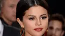 Huda Kattan, mentor kecantikan yang dikalahkan Selena ini mendapatkan uang 14 ribu Poundsterling atau sekitar Rp 242 Juta untuk setiap foto yang diunggahnya di akun Instagram pribadinya. (AFP/Bintang.com)