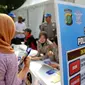 Direktorat Lalu Lintas Polda Metro Jaya saat meluncurkan layanan Surat Izin Mengemudi (SIM) online, Jakarta, Minggu (27/9/2015). Masyarakat dapat memanfaatkan layanan ini untuk memperpanjang SIM mereka. (Liputan6.com/Faizal Fanani)