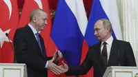 Pertemuan antara Recep Tayyip Erdogan dan Vladimir Putin menghasilkan keputusan untuk mengadakan gencatan senjata di Idib. (Presidential Press Service via AP, Pool)