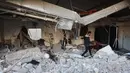 Badan pertahanan sipil Gaza mengatakan bahwa serangan udara Israel meluluhlantakkan beberapa bagian Rumah Sakit Al-Ahli. (Omar AL-QATTAA/AFP)