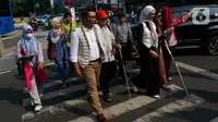 Menurut Ridwan Kamil, pasangan RK-Suswono (RIDO) memiliki komitmen menciptakan Jakarta yang lebih adil dan inklusif bagi semua warganya, termasuk kaum disabilitas. (Liputan6.com/Herman Zakharia)