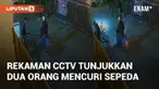 Rekaman CCTV menunjukkan dua orang diduga pelaku pencurian sepeda. Peristiwa ini terjadi di rumah warga di Perumahan Margalaksana Indah II Indramayu