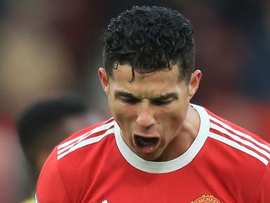 Bintang Manchester United, Cristiano Ronaldo akan melakoni laga ke-16 melawan Manchester City dalam Derby Manchester di Liga Inggris akhir pekan ini. Masih memegang rekor kemenangan, berikut 7 catatan menarik saat CR-7 menghadapi Man City di 15 laga sebelumnya. (AFP/Lindsey Parnaby)