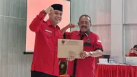 Eri-Armuji resmi mendapat rekomendasi dukungan Pilkada dari PDIP. (Istimewa)