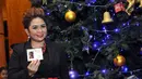 Joy Tobing saat ikut meramaikan acara Christmas Tree Lighting Ceremony di Intercontinental Hotel, Jakarta. Foto diambil pada Kamis (27/11/2014). (Liputan6.com/Panji Diksana)