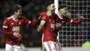 Para pemain Nottingham Forest merayakan gol yang dicetak oleh Ben Brereton ke gawang Arsenal pada laga Piala FA di Stadion City Ground, Minggu (7/1/2018). Arsenal takluk 2-4 dari Nottingham Forest. (AP/Mike Egerton)