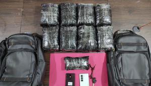 Bungkusan ekstasi di dalam tas ransel. (Antara)