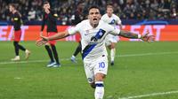Striker Inter Milan Lautaro Martinez merayakan golnya ke gawang Salzburg dalam pertandingan Grup D Liga Champions di Stadion&nbsp;Red Bull Arena, Kamis (9/11/2023) dini hari WIB. (KERSTIN JOENSSON / AFP)