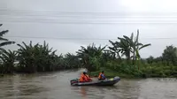 Basarnas sisir sungai cari korban Tewas Tenggelam (Liputan6.com/Felek Wahyu).