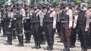 Personel Polri mengikuti apel gabungan gelar pasukan di Silang Monas, Jakarta, Senin (11/4/2022). Polda Metro Jaya mengerahkan sebanyak 5.620 pasukan gabungan Polri-TNI dalam rangka pengamanan aksi unjuk rasa BEM SI. (Liputan6.com/Herman Zakharia)