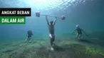 Berita video penyelam bebas Adam Stern melakukan angkat beban dalam air saat berada di Amed, Bali.