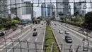 Kondisi lalu lintas di Tol Dalam Kota, Jakarta, Kamis (24/2/2022). Kenaikan tarif Tol Dalam Kota sesuai Keputusan Menteri PUPR No. 74/KPTS/M/2022 tanggal 31 Januari 2022. (merdeka.com/Iqbal S. Nugroho)