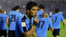 Bintang Uruguay, Luis Suarez mencetak satu gol saat timnya menang telak atas Paraguay 4-0 pada kualifikasi Piala Dunia 2018 Zona Conmebol di Montevideo (7/9/2016) WIB. (AFP/Pablo Porciuncula)