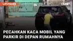 Aksi seorang pria pecahkan kaca mobil di pinggir jalan mengundang perhatian