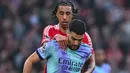 Di babak kedua, Arsenal tetap tampil menekan barisan pertahanan Manchester United. (Paul ELLIS/AFP)