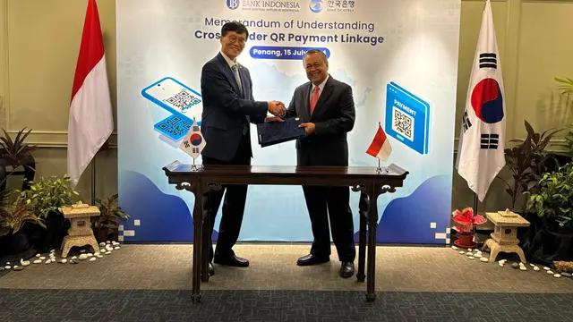 Gubernur BI, Perry Warjiyo menjalin kesepakatan dengan Bank of Korea (BoK) untuk mengimplementasikan pembayarran QRIS antarnegara.
