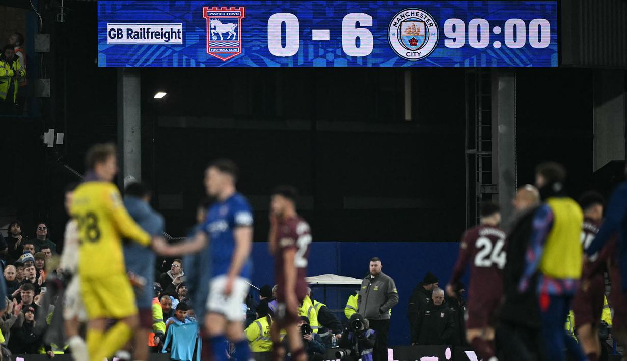 Skor akhir pertandingan Ipswich Town melawan Manchester City pada laga lanjutan Liga Inggris 2024/2025 yang berlangsung di Portman Road, Ipswich, Inggris, Senin (20/01/2025) WIB. (AFP/Ben Stansall)