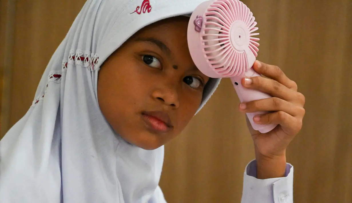 Suhu terpanas yang pernah menerpa kawasan Indonesia terjadi pada 17 April 2023 lalu di Ciputat, Banten dengan suhu 37,2 derajat Celcius.  (AFP/CHAIDEER MAHYUDDIN)