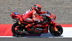 Pembalap Ducati Lenovo Team, Marc Marquez. (Bola.com/Dok.Sonny TUMBELAKA / AFP).