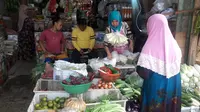 Pedagang Sayur di Pasar Benhil, Wati (44). Sumber: liputan6.com/Bawono