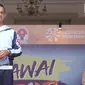 Gubernur DKI Jakarta Anies Baswedan memberikan sambutan saat pawai obor Asian Para Games 2018  di Balai Kota DKI Jakarta, Minggu (30/9). Asian Para Games  akan berlangsung 6-13 Oktober 2018 di Jakarta dan Palembang. (Liputan6.com/Herman Zakahria)