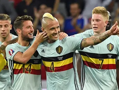 Pemain berdarah Indonesia, Radja Nainggolan, mencetak gol kemenangan Belgia atas Swedia, 1-0, pada laga terakhir Grup E Piala Eropa 2016 di Allianz Riviera, Nice, Kamis (23/6/2016) dini hari WIB. (AFP/Jonathan Nackstrand)