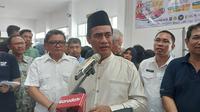 Menteri Pertanian Andi Amran Sulaiman Sidak operasi pasar yang dilakukan di Kantor Pos, Jakarta Timur. (Arief/Liputan6.com)