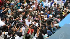 Blusukan menjadi tren bagi para capres dan cawapres untuk menjaring massa yang akan ikut dalam pesta   demokrasi. Setelah Jokowi, Cawapress Hatta Radjasa juga menggunakan cara blusukan  (Liputan6.com/Johan Tallo)