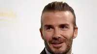 David Beckham yakin AC Milan bakal kembali berjaya. (AFP / TORU YAMANAKA)