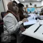 Peserta FGD yang dihadiri sekitar 14 lembaga pemantau pemilu yang digelar KPU untuk membahas proses pemungutan dan penghitungan suara pada penyelenggaraan Pilkada serentak mendatang di gedung KPU, Jakarta, Selasa (29/9). (Liputan6.com/Helmi Afandi)