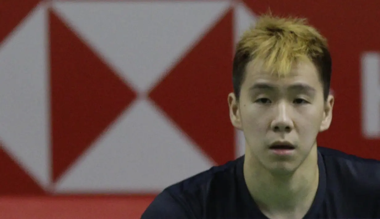 Ganda putra Indonesia, Marcus Gideon, tampak fokus saat melawan ganda Jerman pada Indonesia Masters 2019 di Istora Senayan, Jakarta, Rabu (23/1). Kevin / Marcus lolos ke 16 besar. (Bola.com/M. Iqbal Ichsan)