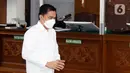 Terdakwa kasus obstruction of justice atau merintangi penyidikan pembunuhan berencana Brigadir Nofriansyah Yosua Hutabarat alias Brigadir J, Arif Rachman Arifin bersiap untuk mengikuti sidang lanjutan di Pengadilan Negeri Jakarta Selatan, Kamis (23/2/2023). Sidang tersebut beragenda pembacaan vonis oleh majelis hakim. (Liputan6.com/Herman Zakharia)