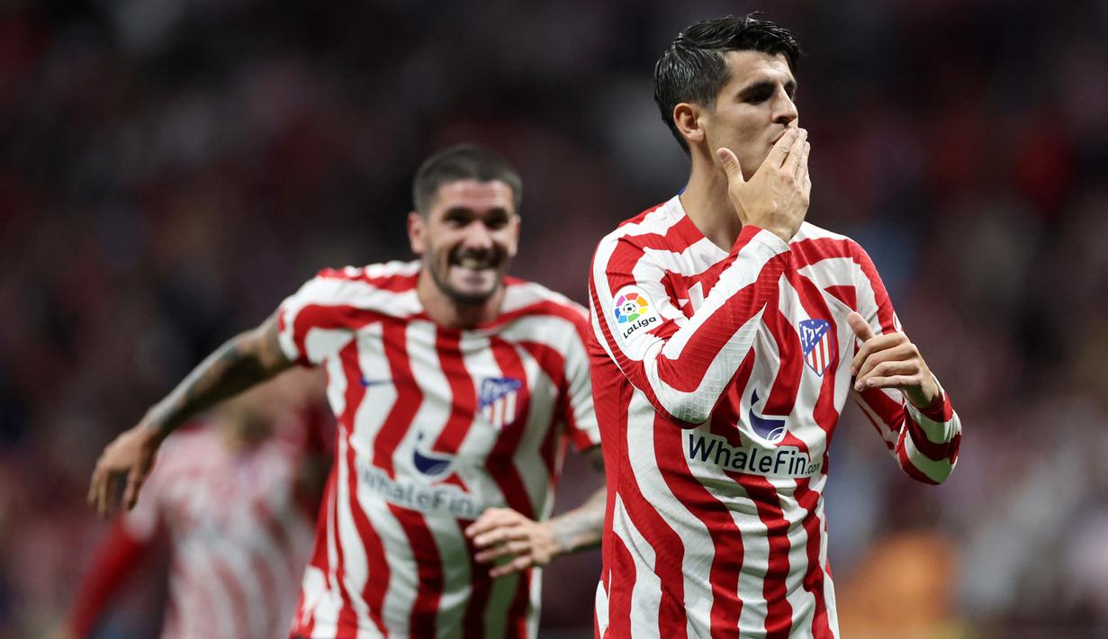 Selebrasi striker Atletico Madrid, Alvaro Morata setelah mencetak gol ke gawang Cadiz pada laga Liga Spanyol 2022/2023 di Wanda Metropolitano Stadium, Madrid (3/5/2023). Alvaro Morata yang menjadi milik Chelsea dipermanenkan Atletico Madrid sejak awal musim 2022/2023 dengan mahar 35 juta euro setelah sebelumnya sempat berstatus pinjaman mulai tengah musim 2018/2019 hingga akhir musim 2019/2020. Ia juga sempat dipinjamkan ke Juventus pada 2020/2021 dan 2021/2022. (AFP/Pierre-Philippe Marcou)