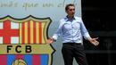 Pelatih baru Barcelona, Ernesto Valverde, diperkenalkan di Stadion Camp Nou, Barcelona, Rabu (31/5/2017). Mantan pelatih Athletic Bilbao ini didaulat menggantikan posisi Luis Enrique. (AFP/Lluis Gene)