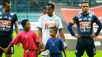 Achmad Kurniawan dkk. di Arema membidik misi lain di laga terakhir di TSC. (Bola.com/Iwan Setiawan)