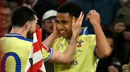 Namun, mereka kembali kecolongan dari tuan rumah pada menit ke-85. Shea Charles sukses melesatkan gol yang menghentikan perjalanan Arsenal di Piala FA. (AFP/Glyn Kirk)