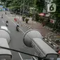 Kamera Closed Circuit Television (CCTV) terpasang di Jalan MH Thamrin, Jakarta, Sabtu (23/1/2021). Direktorat Lalu Lintas Polda Metro Jaya menargetkan 100 kamera electronic traffic law enforcement (ETLE) terpasang di sejumlah ruas jalan di Jakarta pada 2021. (Liputan6.com/Faizal Fanani)