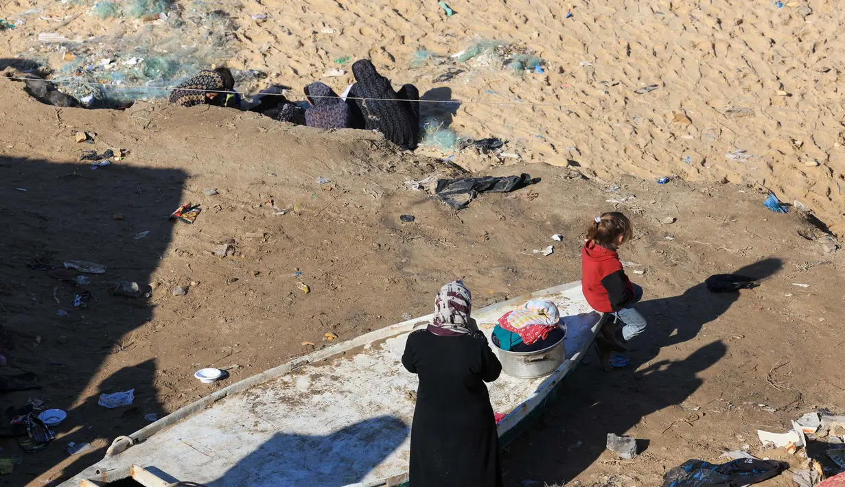 Kedua belah pihak yang bertikai (Hamas dan Israel) menyepakati gencatan senjata. (Mahmud Hams/AFP)