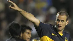 Penyerang Boca Juniors, Rodrigo Palacio merayakan golnya ke gawang Deportivo Tachira dalam pertandingan penyisihan Grup 2 Copa Libertadores di Stadion La Bombonera, Buenos Aires, 30 April 2009. AFP PHOTO/Juan Mabromata