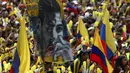 Sebuah gambar James Rodriguez dibentangkan suporter saat selebrasi penyambutan Timnas Kolombia di taman Bolivar, Bogota, (6/7/2014). (REUTERS/John Vizcaino)