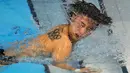 Haram Woo asal Korea Selatan saat final loncat indah 3m putra pada Olimpiade Tokyo 2020 di Tokyo Aquatics Center, Selasa (3/8/2021). (Foto: AP/Dmitri Lovetsky)
