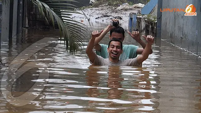 foto-banjir-cililitan-utama130116b.jpg