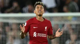 Roberto Firmino bukanlah nama baru lagi di Liga Inggris. Ia bergabung ke Liverpool saat musim 2015/2016. Meski kerap menjadi pilihan kedua usai kedatangan Darwin Nunez, pria 30 tahun tersebut telah mencetak tiga gol dan tiga assist untuk The Reds pada Liga Inggris musim ini. (AFP/Paul Ellis)