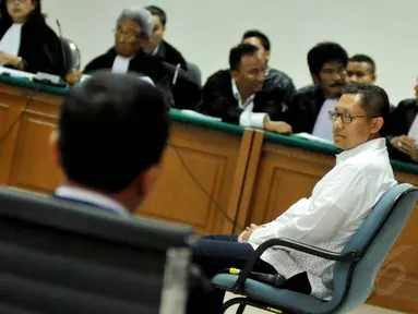 Anas Urbaningrum menghadapi sidang perdana di Pengadilan Tipikor, Jakarta, Jumat (30/5/14). (Liputan6.com/Johan Tallo)