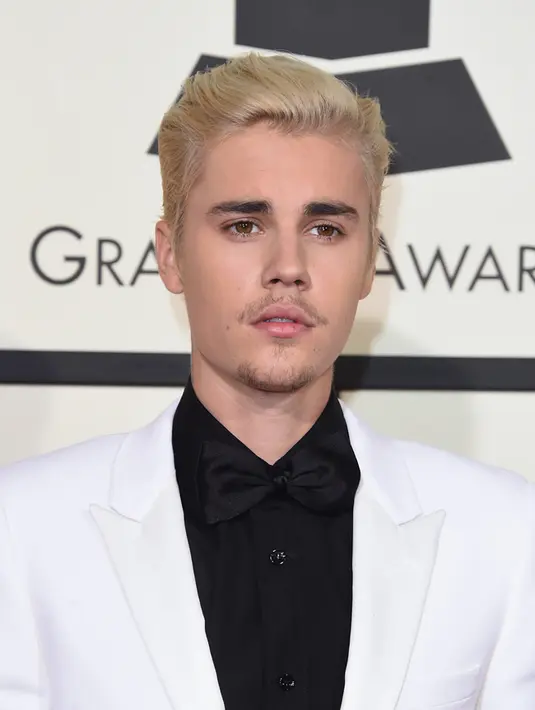 Beberapa waktu akhir ini mungkin menjadi waktu yang sulit untuk para Beliebers. Pasalnya, sang idola yang kini mereka puja, sering memperlihatkan sifat aneh didepan publik. (AFP/Bintang.com)
