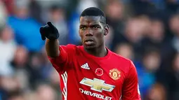 Ekspresi Paul Pogba saat merayakan gol pertama untuk MU pada pertandingan Liga Premier Inggris, Swansea City menjamu Manchester United di Stadion Liberty, Inggris (6/11). Pogba berhasil menyumbang satu gol untuk MU. (Reuters/John Sibley)